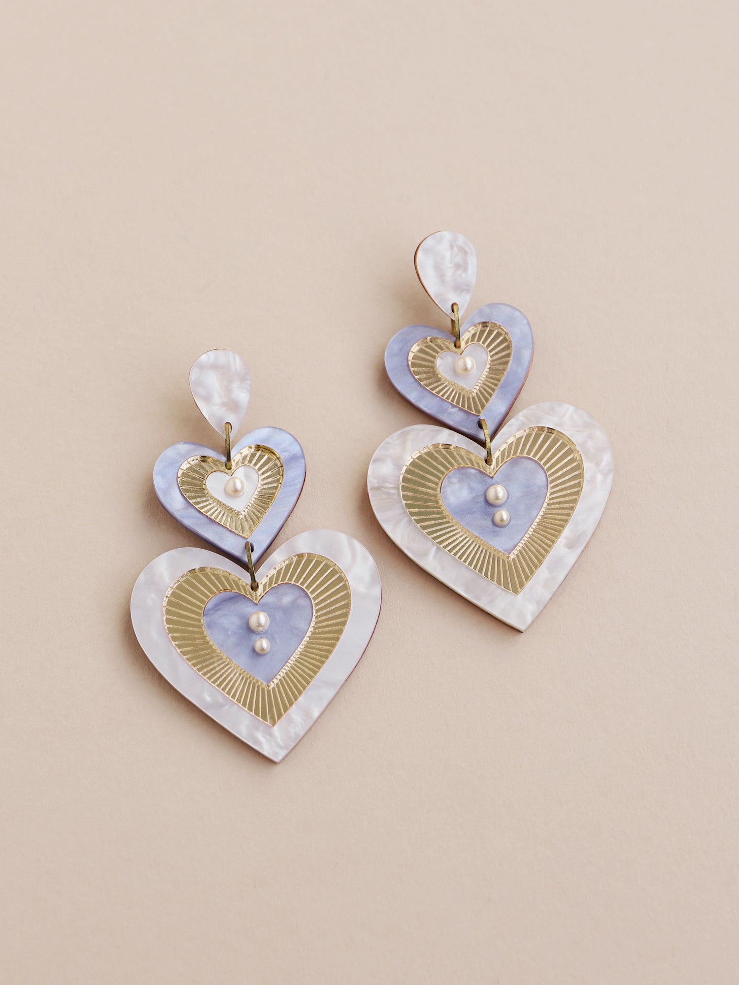 Blue, white & gold heart statement earrings. Made from acrylic with high quality glass pearl detail and sterling silver earring posts & butterflies. Handmade in the UK by Wolf & Moon.