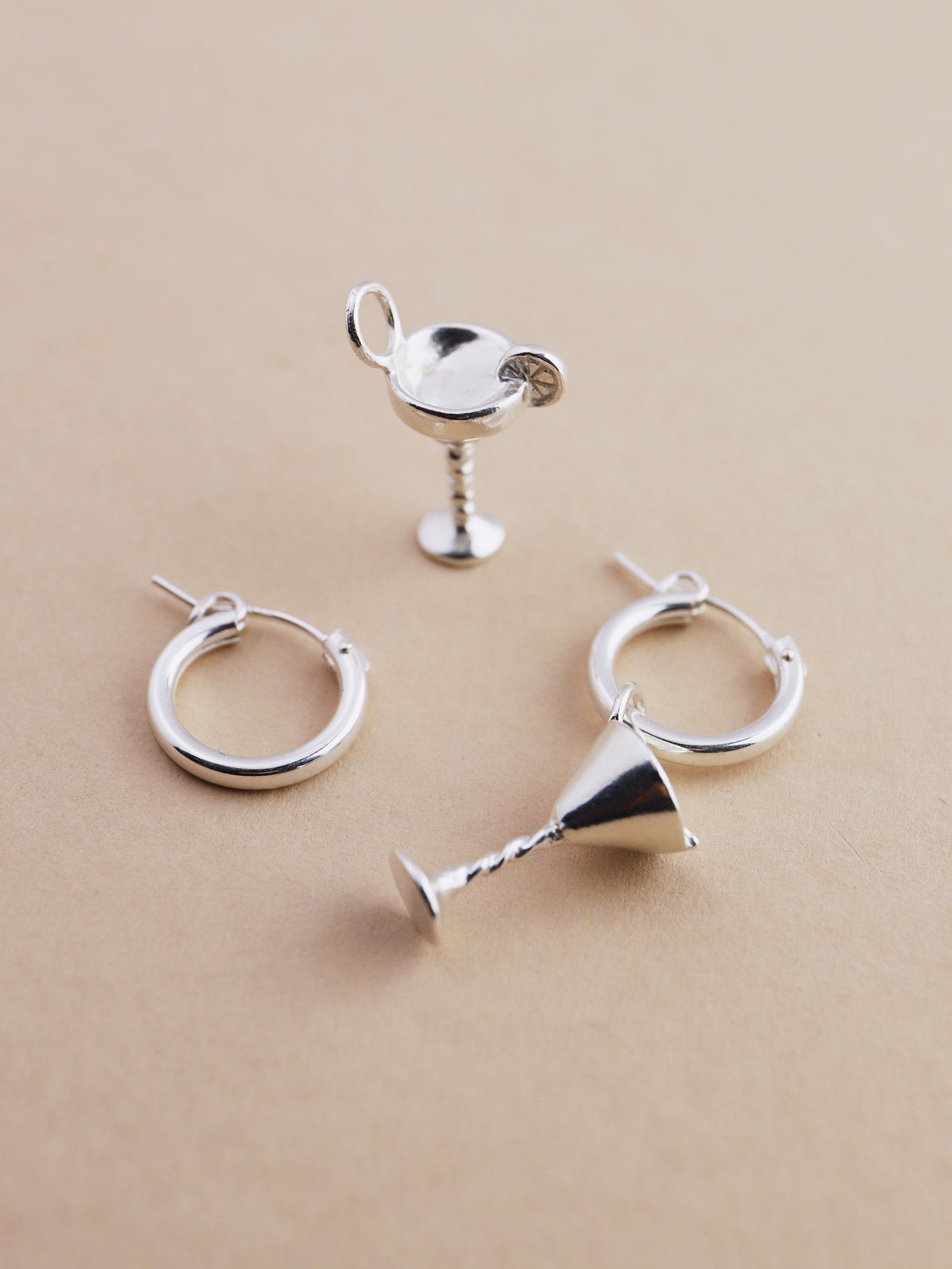 Margarita & dirty martini hoop earrings. Made from recycled sterling silver with optional 24k gold-plated vermeil. Handmade in the UK by Wolf & Moon.