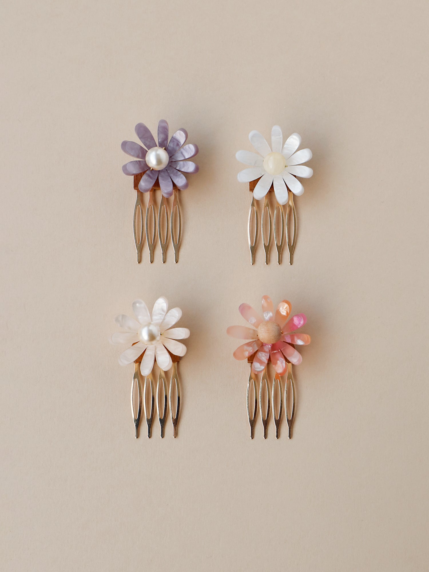 Hand-formed flower acrylic hair comb. Made with acrylic and a gold-tone or black metal hair comb. Handmade in the UK by Wolf & Moon.