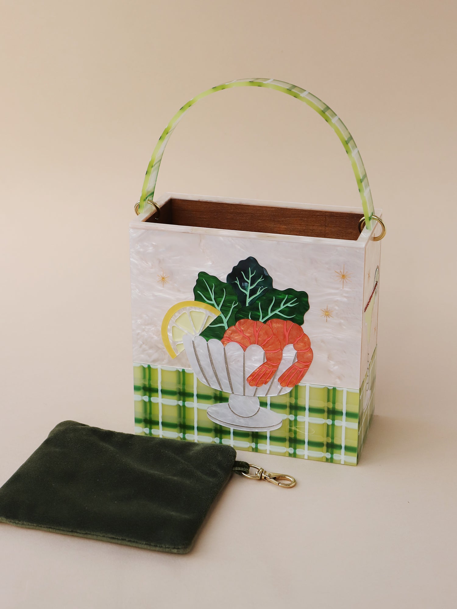 Dinner party themed bag. Made with an acrylic exterior, FSC-approved wood interior and solid brass findings. Handmade in the UK by Wolf & Moon.