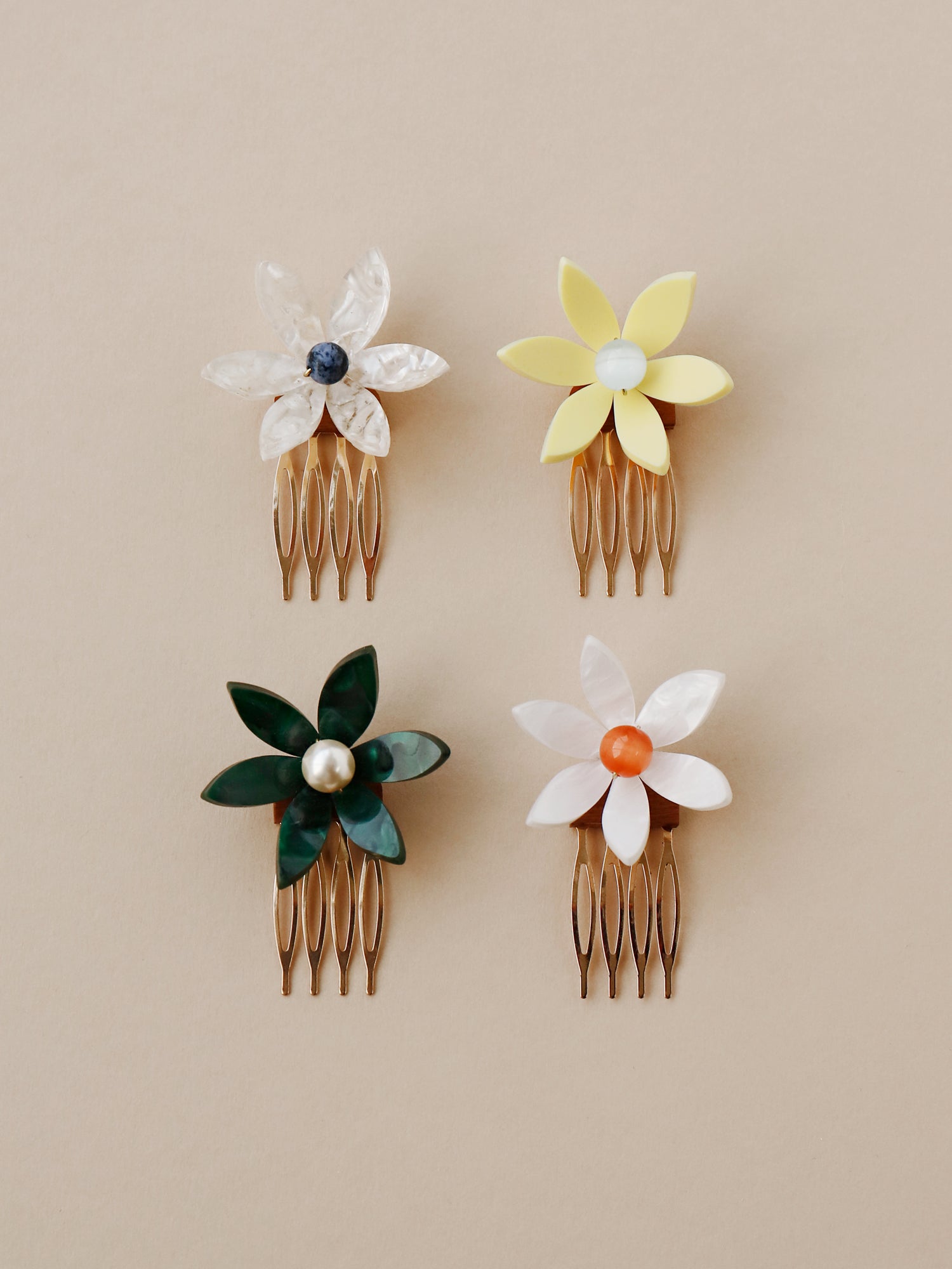 Hand-formed flower acrylic hair comb. Made with acrylic and a gold-tone or black metal hair comb. Handmade in the UK by Wolf & Moon.