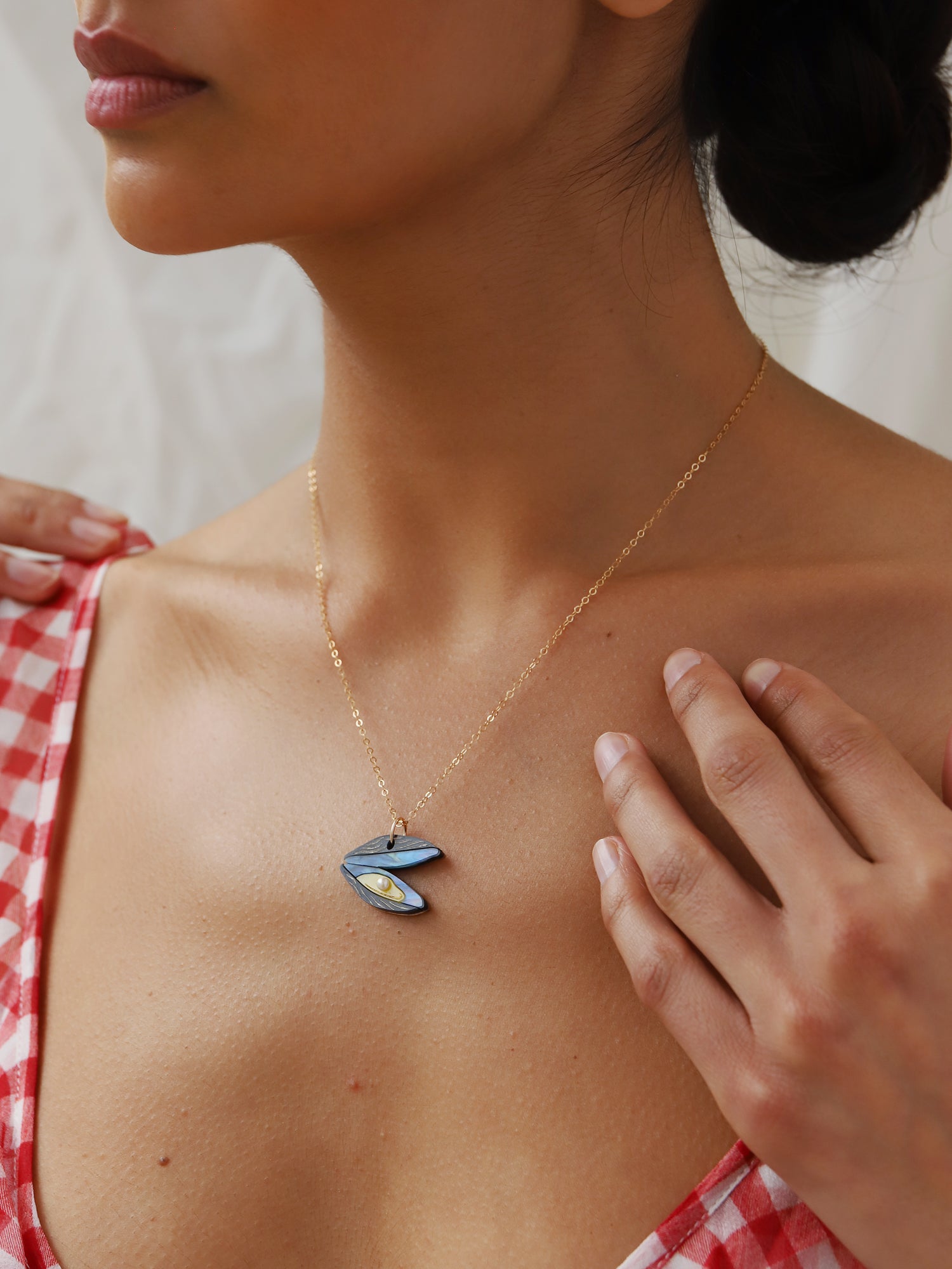 Blue mussel necklace. Made from acrylic with glass pearls and 14k gold-filled findings & chain. Handmade in the UK by Wolf & Moon.