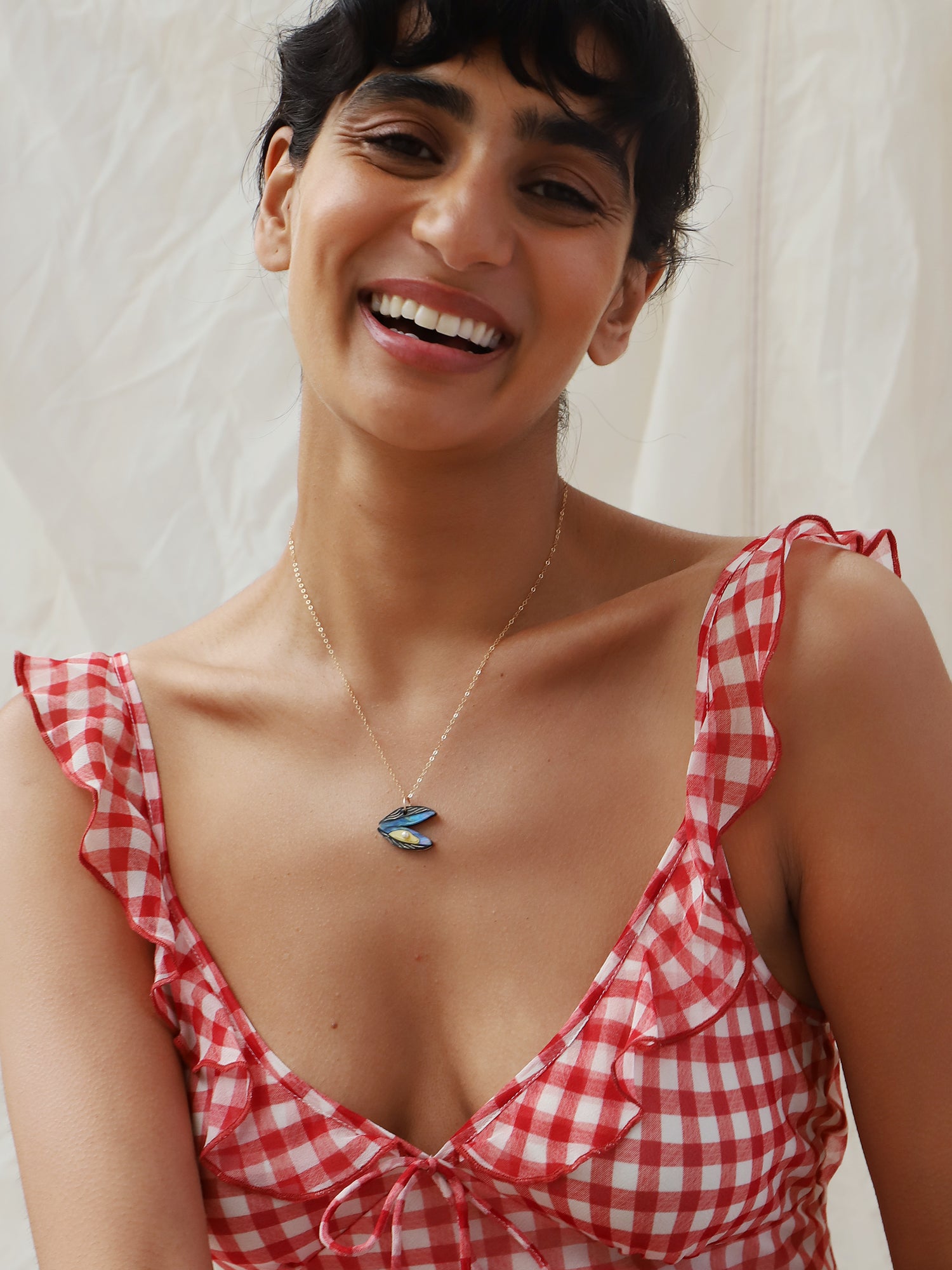 Blue mussel necklace. Made from acrylic with glass pearls and 14k gold-filled findings & chain. Handmade in the UK by Wolf & Moon.