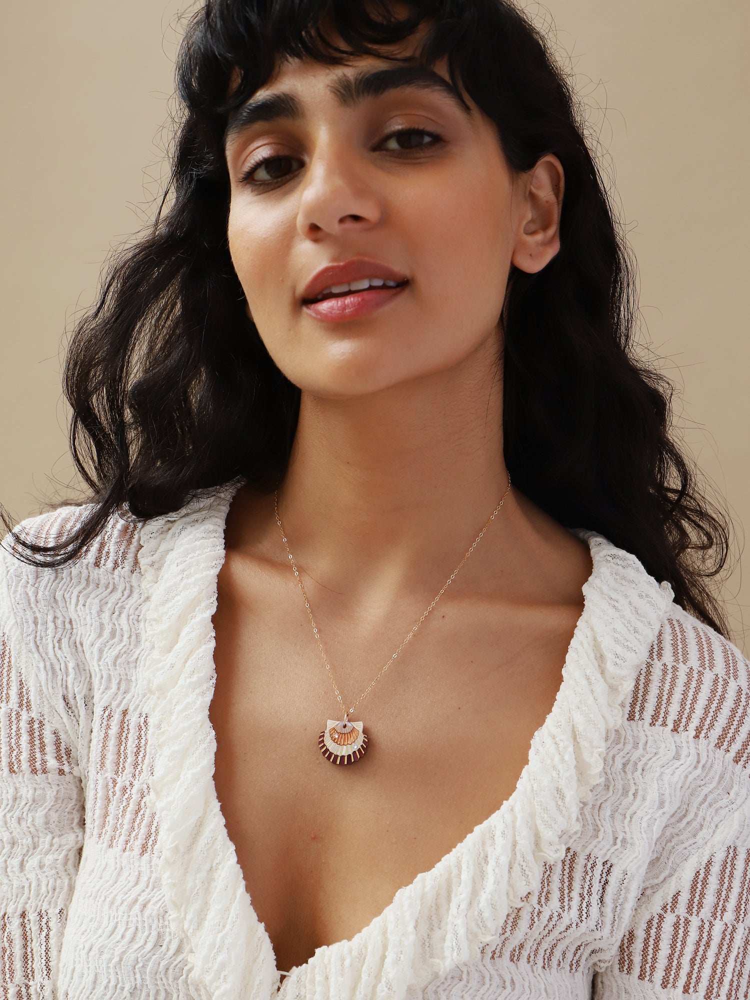 Peach & cream scallop shell necklace. Made from acrylic with high quality glass crystals and 14k gold-filled findings & chain. Handmade in the UK by Wolf & Moon.