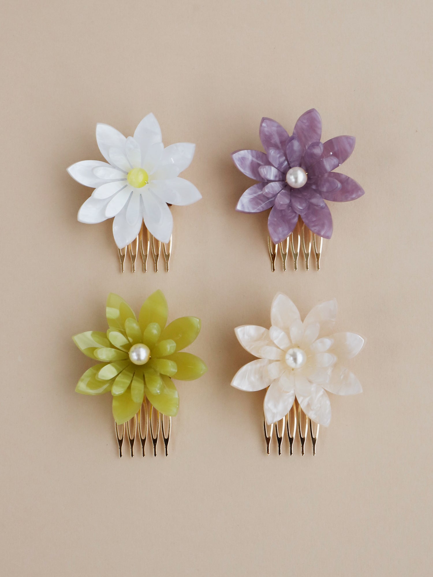 Hand-formed flower acrylic hair comb. Made with acrylic and a gold-tone or black metal hair comb. Handmade in the UK by Wolf & Moon.