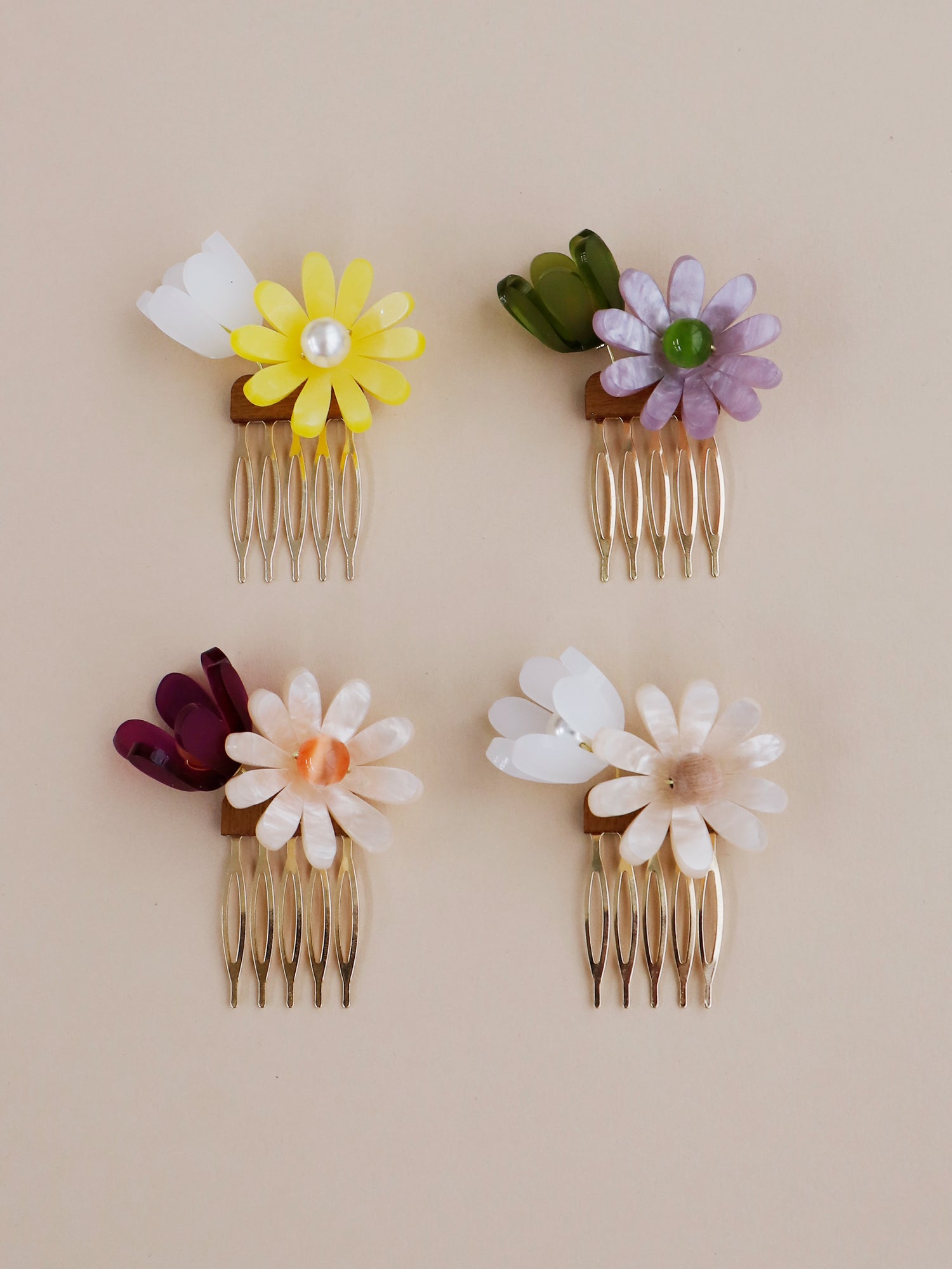 Hand-formed flower acrylic hair comb. Made with acrylic and a gold-tone or black metal hair comb. Handmade in the UK by Wolf & Moon.