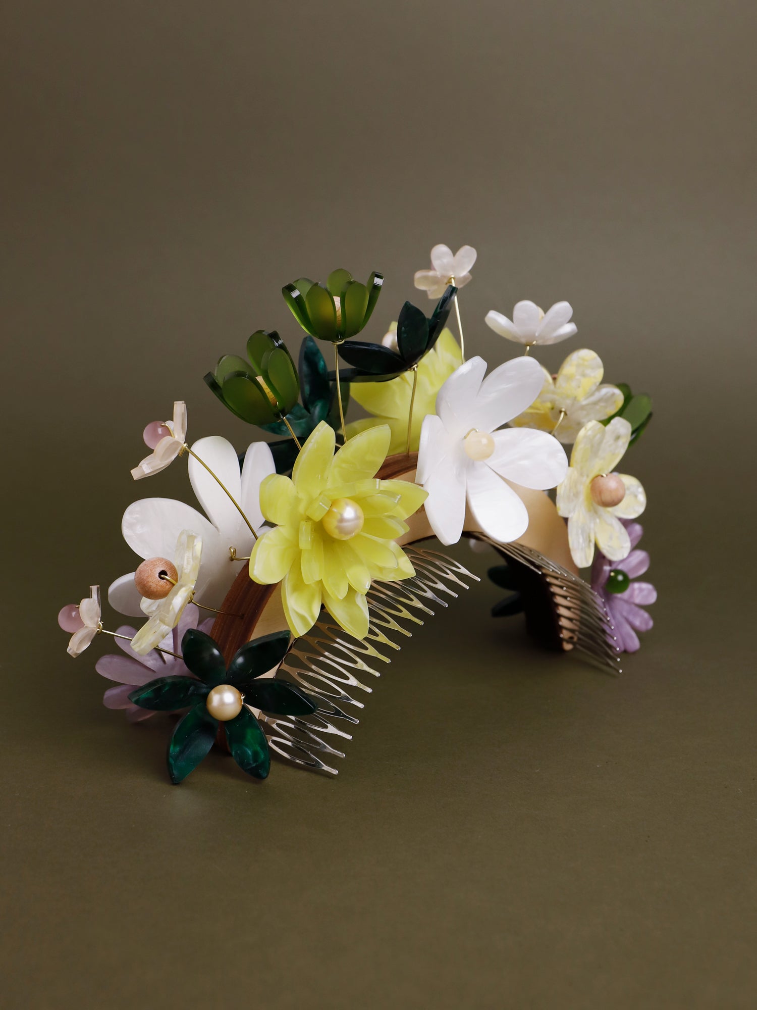 Hand-formed flower acrylic headpiece. Made from acrylic, FSC approved wood with gold-tone or black metal hair combs. Handmade in the UK by Wolf & Moon.