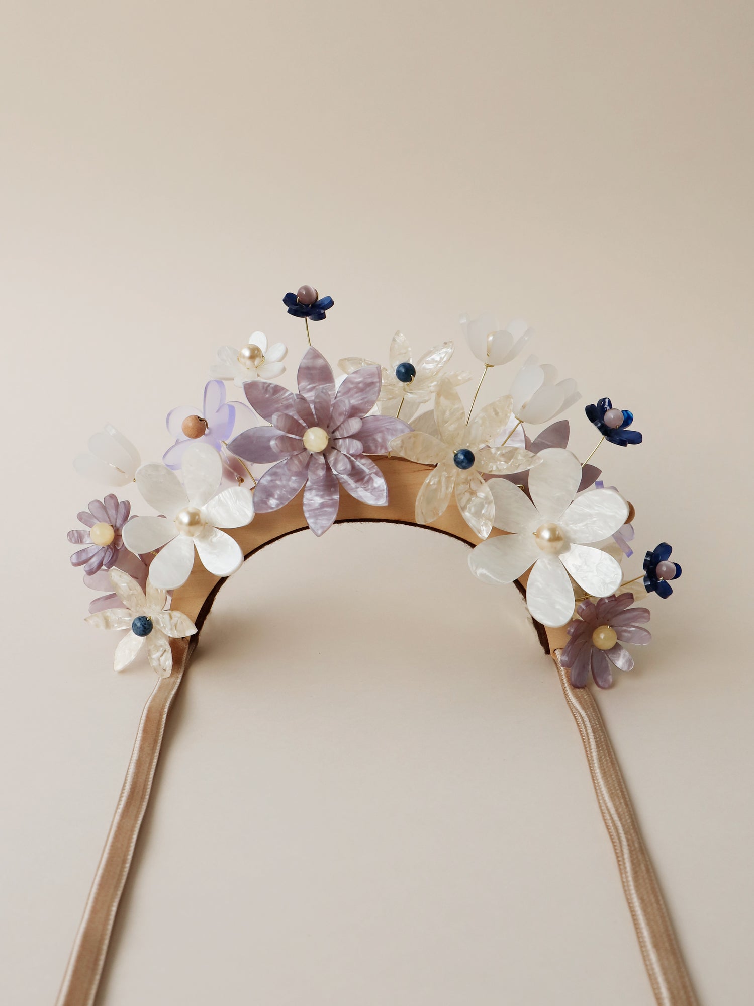 Hand-formed flower acrylic headpiece. Made from acrylic, FSC approved wood with gold-tone or black metal hair combs. Handmade in the UK by Wolf & Moon.