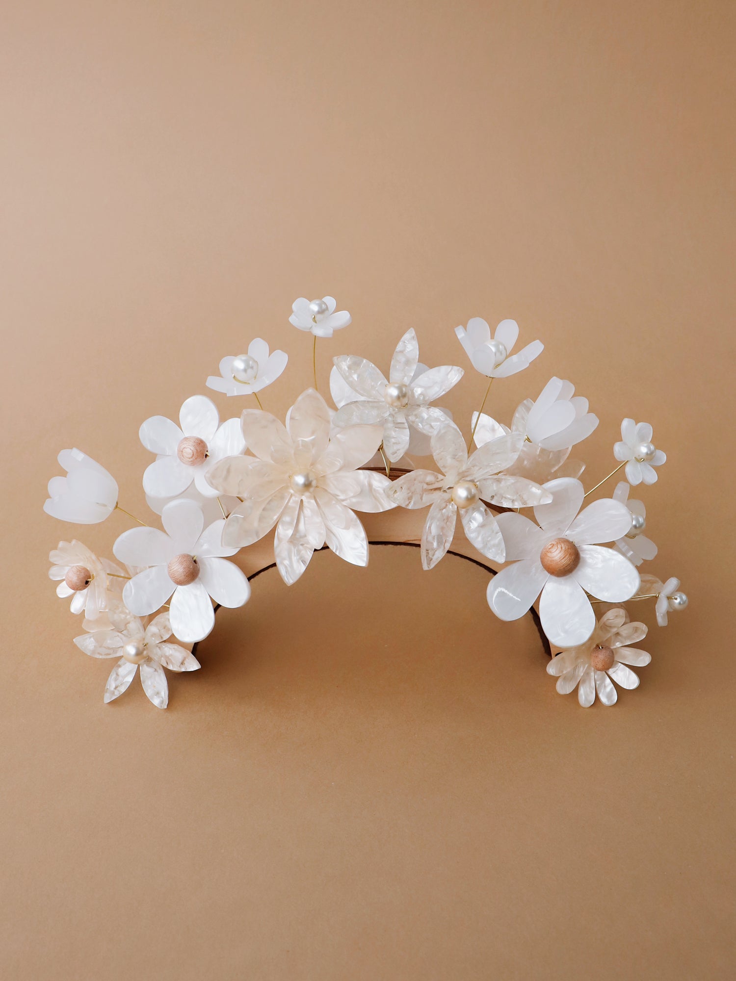 Hand-formed flower acrylic headpiece. Made from acrylic, FSC approved wood with gold-tone or black metal hair combs. Handmade in the UK by Wolf & Moon.