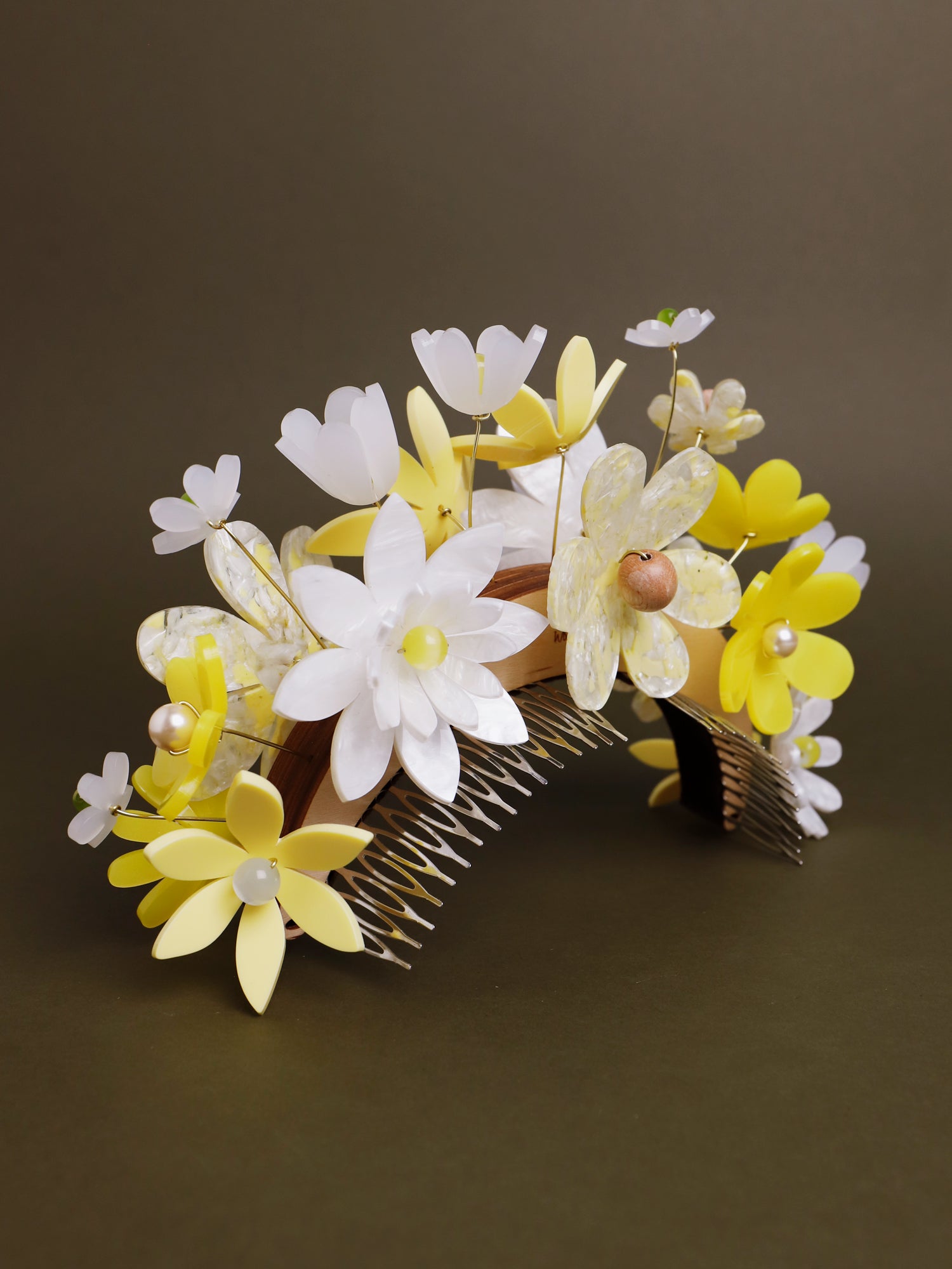 Hand-formed flower acrylic headpiece. Made from acrylic, FSC approved wood with gold-tone or black metal hair combs. Handmade in the UK by Wolf & Moon.