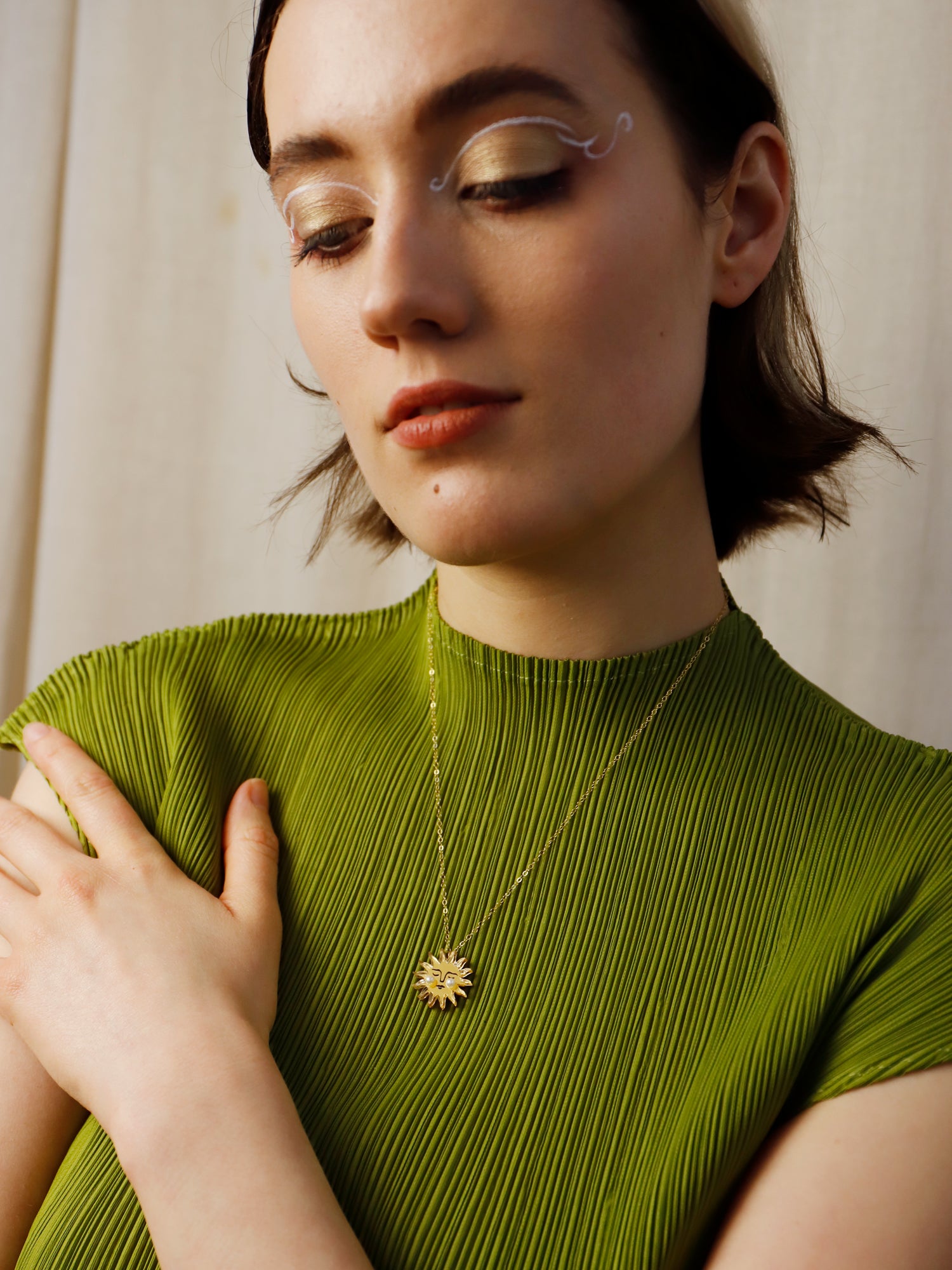 Sun Necklace in Gold. Pendant necklace made with laser cut acrylic, Czech glass pearls and hand inked details. Handmade in the UK by Wolf & Moon.